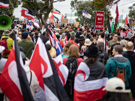 Protestors at the 2024 Hikoi across Auckland Harbour Bridge, with tino rangatiratanga flags