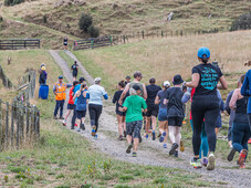 Trail runners, all together, smiles at blazing hills