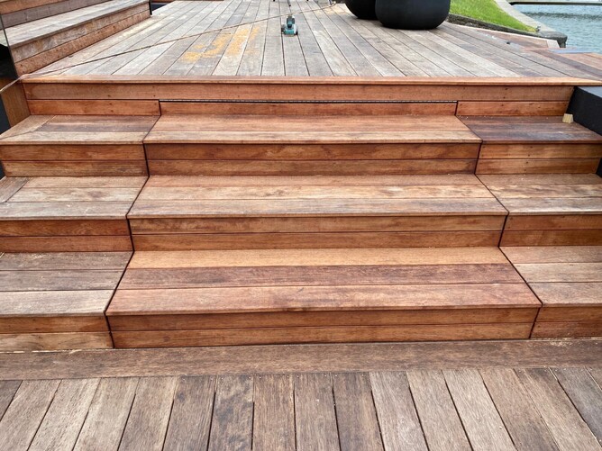 Hidden storage under custom stairs