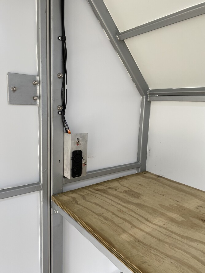 Electronics in custom tandem axle enclosed trailer build by Alted Engineering