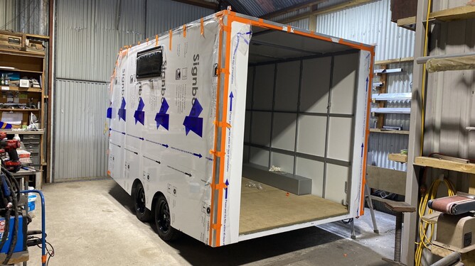 Lining the custom 3.6m tandem axle enclosed trailer Alted Engineering