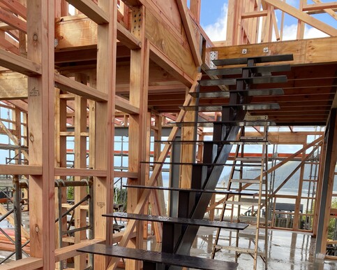 Alted steel fabrication – structural steel frame installation on residential building site, Tairua