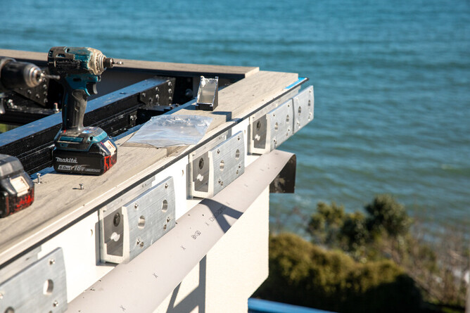 TreadTech aluminium deck structure integrated with Viking RoofSpec RoofTrak waterproof fixings.