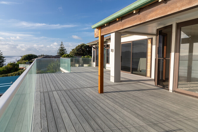 NZ installed frameless glass balustrade recessed into TreadTech continuous fixing channel.