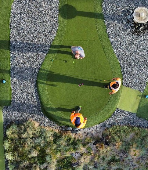 Birds eye view shot of The Range mini golf course with friends playing