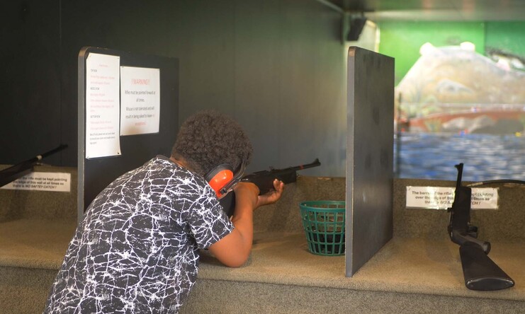 Young man shooting CO2 air rifle at The Range Warkworth indoor facility