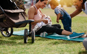 Childcare worker with baby