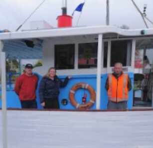 New owners Sarah Ensor and brother Rusty Ensor with former owner Trevor Pennington