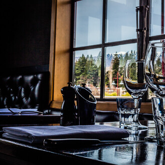 A view of a table set at Pier 19 restaurant, one of the Queenstown restaurants founded by Grant Hattaway.