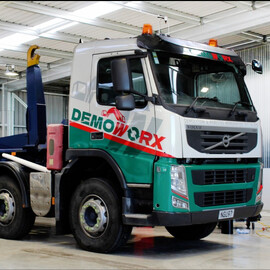 Demoworx vehicle signage designed in line with their brand created by Kaz - Design. Brand. Web.