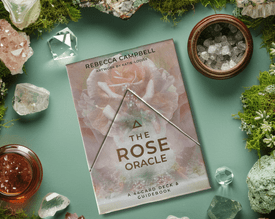 The Rose Oracle by Rebecca Campbell on a moss and gem background
