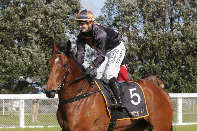 A smiling Courtney Barnes aboard Lickety Split - Photo:  Trish Dunell