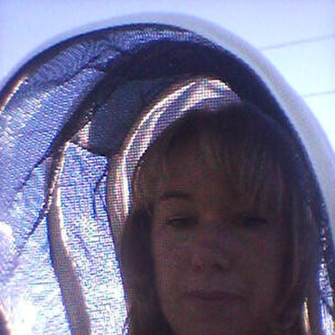 Sarah C in her beekeeping veil