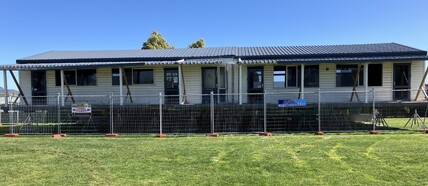 Double classroom block arrives onsite awaiting it's make over
