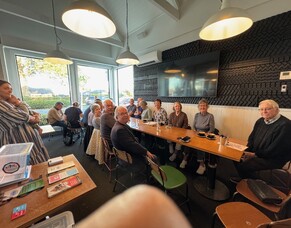 A Jovial Neighbourhood Meeting at the Local Brasserie