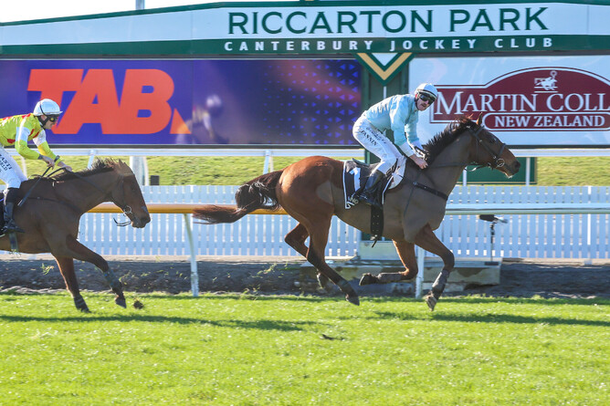 West Coast powering to victory in the Racecourse Hotel & Motor Lodge Grand National Steeplechase (5600m) at Riccarton Park on Saturday. - Photo: Race Images South