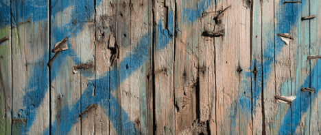 graffiti on wooden fences often require a repaint