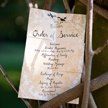 Wedding order of service design – peach lace and bird illustration
