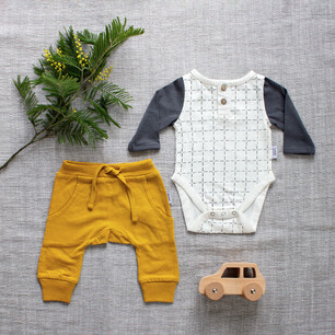 Childrens fashion photography for Kauri and Sons Studio flatlay baby clothing