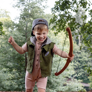 Childrens fashion photography for Kauri and Sons outdoor location bow and arrow