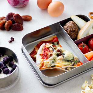 Editorial photography for Living Lightly book by Nicola Turner pizza in metal lunchbox 