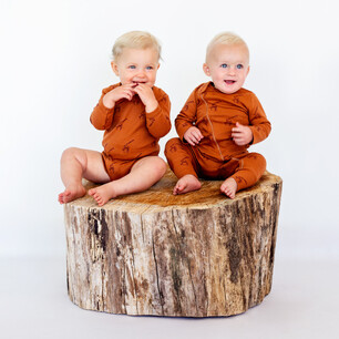 Studio photography for Kauri and Sons childens fashion with wooden stump