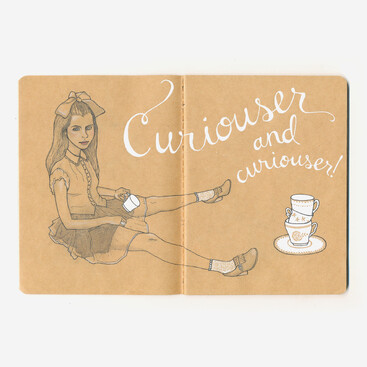 Kraft paper notebook sketch of Alice in wonderland sitting down with teacups. Typography says "curiouser and curiouser"