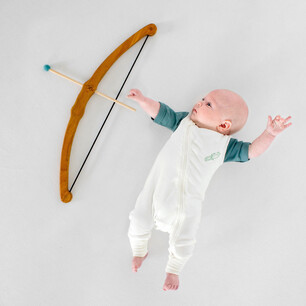Childrens fashion photography for Kauri and Sons studio overhead using Needle and Nail bow and arrow