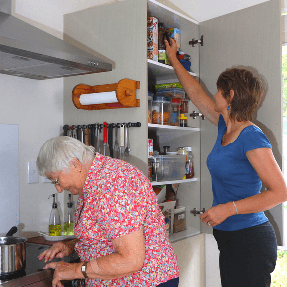 Jo Pannabecker elders at my table dietitian with her mother looking at a recipe book