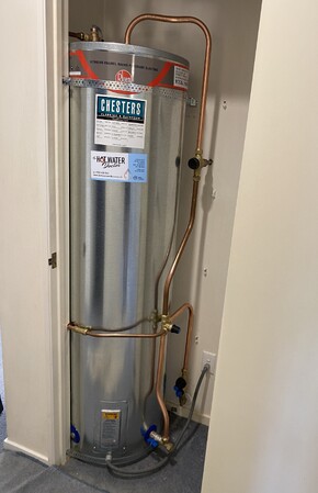 Mains Pressure Hot Water Cylinder Replacement with new copper pipes and new valves. Tidy copper pipework