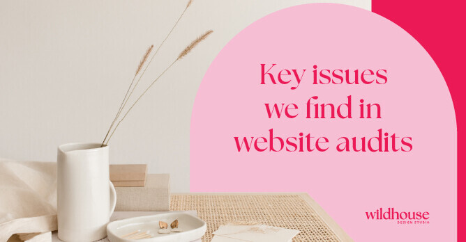 Graphic with the text 'Key issues we find in website audits' in a pink arch on the right, with a styled workspace featuring a vase, tray, and papers on the left. Wildhouse Design Studio logo in the lower right corner