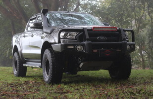 2017 Ford Ranger PKII Featuring an ARB Summit Bullbar with Fog Lights, ARB Intensity LED Light Bar, TJM Snorkel, OME 50mm Suspension Lift, ARB Under Vehicle Protection Plate, Flares, Mickey Thompson ATZ P3 Tyres & 16" Wildland Evade Imitation Bead Lock Wheels