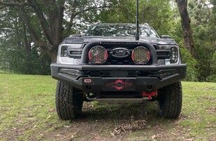  Featuring an ARB Summit Sahara Bar with Optional Embedded 20" LED Lightbar, Revo 10,000lb Winch, ARB Intensity Solis Driving Lights, OME Suspension Lift, ARB Recovery Point, ARB Under Vehicle Protection Plate, ARB Side Steps and Hercules Terra Trac Tyres.