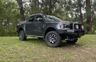 Featuring an ARB Summit Sahara Bar with Optional Embedded 20" LED Lightbar, Revo 10,000lb Winch, ARB Intensity Solis Driving Lights, OME Suspension Lift, ARB Recovery Point, ARB Under Vehicle Protection Plate, ARB Side Steps and Hercules Terra Trac Tyres.