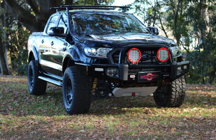 2019 Ford RangerFeaturing an ARB Sahara Bar with ARB 32 Intensity Lights & Black Covers, ARB Summit Side Steps, RhinoRack Roof Racks, ARB RAW Rear Step Towbar, ARB Under Vehicle Protection Plate, OME Suspension Lift, MAC Lid, Method Wheels & Mickey Thompson ATZ P3 Tyres.