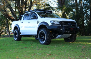 2018 Ford Ranger PXII Featuring a Drivetech4x4 Rival Aluminium Bull Bar with LED Fog Lights, Drivetech4x4 Under Armour Protection, ARB Summit Steps, Drivetech4x4 30" Lightbar, OME Suspension Lift, RhinoRack Pioneer Backbone & Tradie Tray, Lenso Wheels and Mickey Thompson MTZ P3 Tyres