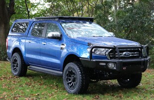 2019 Ford Ranger Featuring an ARB Summit Bar, OME Front Suspension, RhinoRack Pioneer Platform Tray with Backbone Mounting, Black Rhino Wheels, Mickey Thompson ATZ P3 Tyres and ARB Summit Raw Rear Step Towbar.