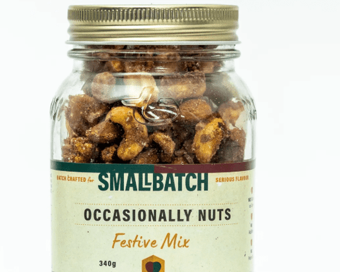 Occasionally Nuts Festive Mix in a stylish mason jar — premium blend of roasted nuts, aromatic spices and festive flavours — a tasteful gourmet gift complementary to floral arrangements at Flowers by Joanne