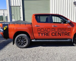 vehicle graphics on right side of Road Rubber Tyre Centre vehicle alternate design