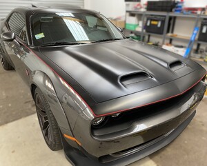 Right and front view of Dodge Challenger with pinstriping