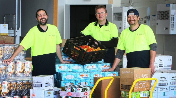 Peter Nicholas, Steve Gray, and Robert Hill distribute food to people and organisations in need across Northland.  - Photo / Tania Whyte / Northern Advocate