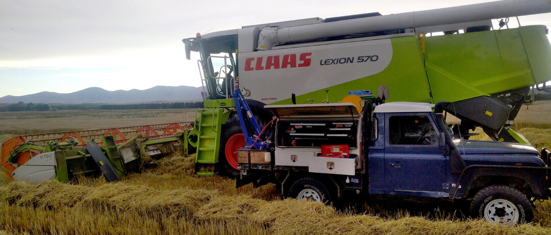 Onsite combine harvester repairs in the Maniototo. AEM brings servicing to you.