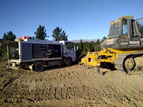Komatsu D65 bulldozer receiving hydraulic repairs using our Ryco hose truck.