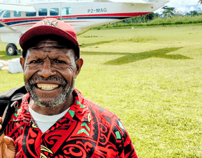 A Remote Village Buy Bibles From The Back of the Plane