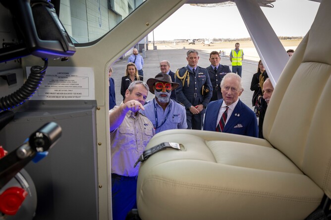 Simon Wunderli and Joseph Tua with the King. Photo Credit: Andy Aitchison.