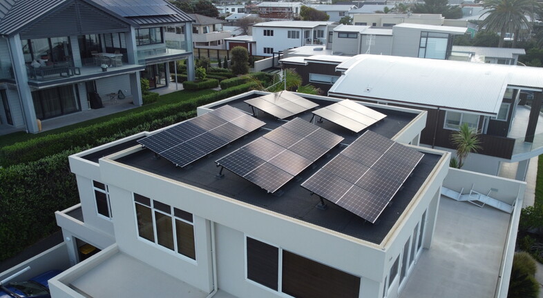 Solar panels installed with tilts on roof of beachside home in Mount Maunganui