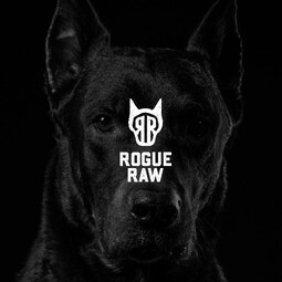 Rogue Raw logo overlaid on an image of a Doberman