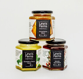 three jars of Lewis Farm honey products