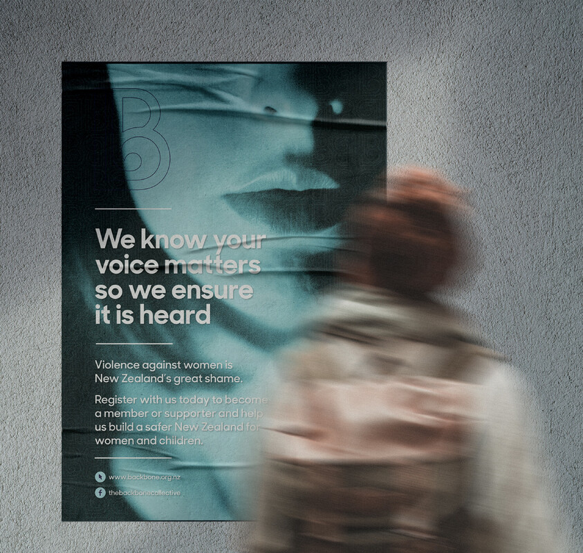 Poster on wall with a womans mouth.  Reads 'We know your voice matters so we ensure it is heard"