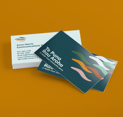 Te Puna Rau Aroha business cards on orange